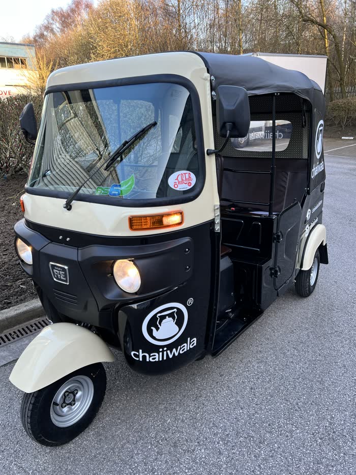 Chaiiwala branded tuk tuk in cream and black