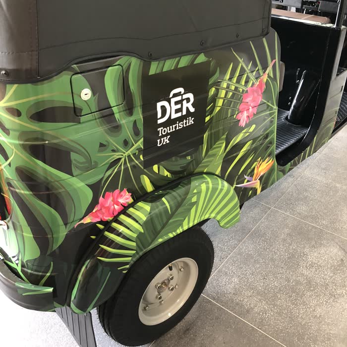 DER Touristik UK tuk tuk with a tropical leaf print wrap