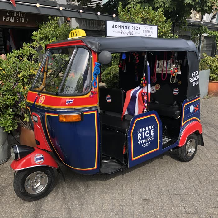 Johnny Rice Thai restaurant tuk tuk in red, white and blue