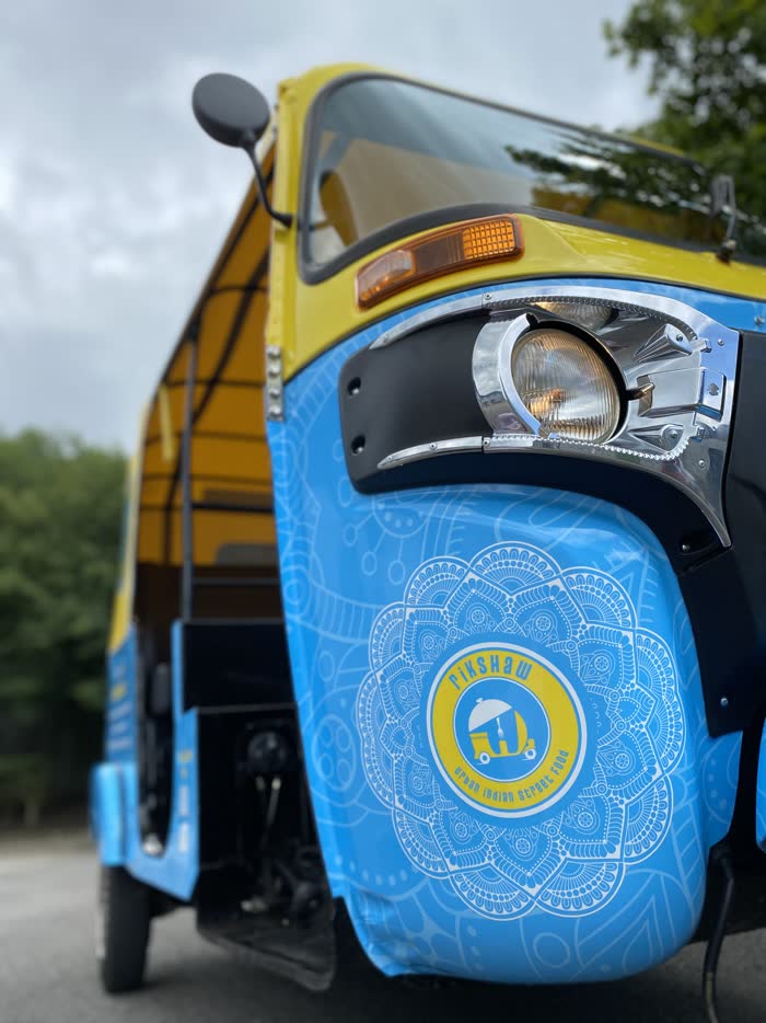 Rikshaw Urban Indian Kitchen tuk tuk in blue and yellow