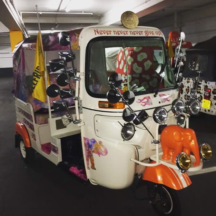 'Never never never give up' hand-painted charity tuk tuk