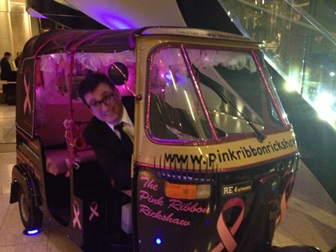 Buying our first tuk tuk — the Pink Ribbon Rickshaw — at a charity ball