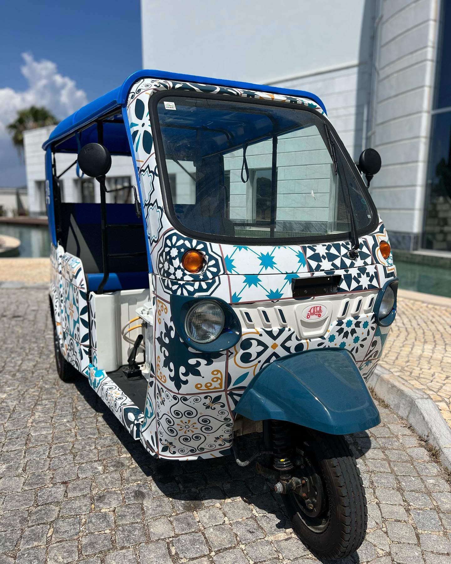 Our Mahindra Treo tuk tuk looking splendid in Portugal with a full colour printed Portuguese Tile vinyl wrap. Every desi — Tuk Tuk UK